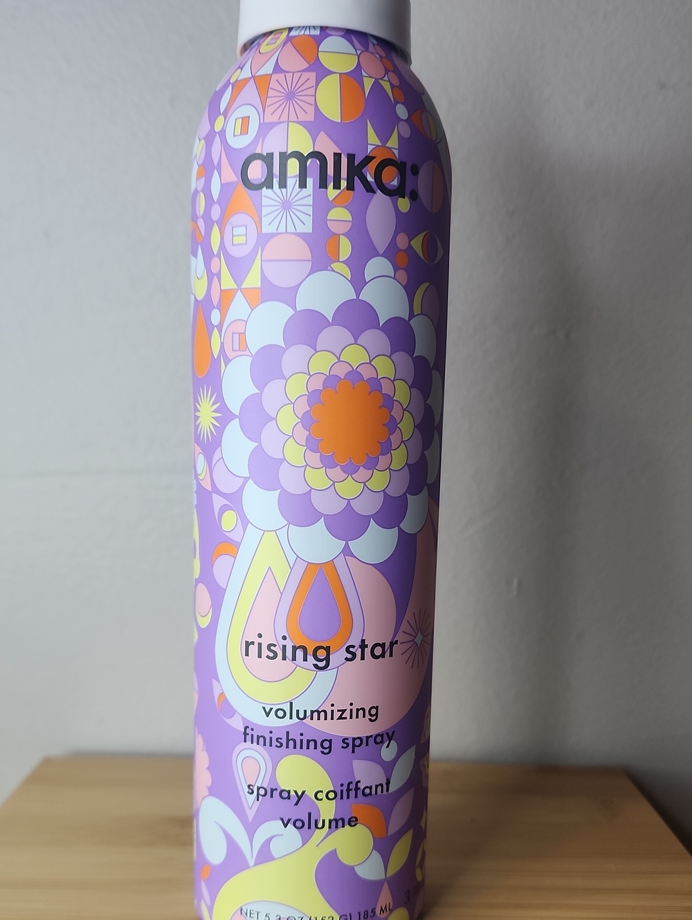 amika volumizing finishing spray — purple, orange, yellow